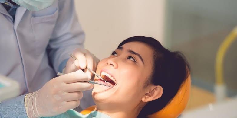 How a Brooklyn Dentist Helps You Maintain a Healthy Smile